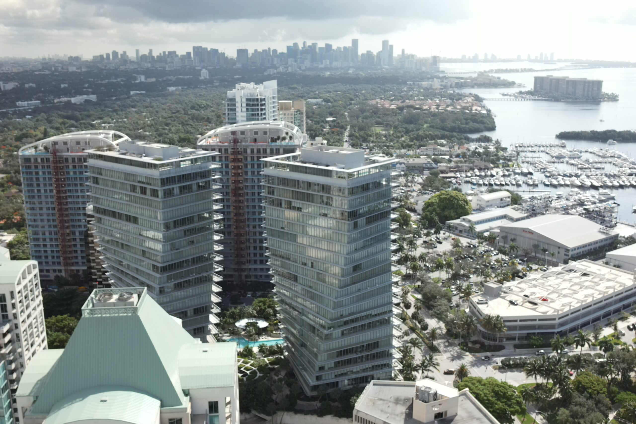 Aerial drone photo of waterfront condominium towers in Florida